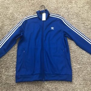 Adidas men track suit